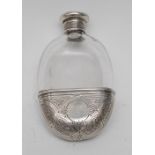A Victorian silver mounted clear glass flattened ovoid hip flask, screw-fitting cover,