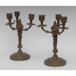 A pair of 19th century French bronze three-branch gilt patinated bronze candelabra,