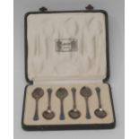 Liberty & Co - a set of six Art Nouveau style silver and enamel coffee spoons,