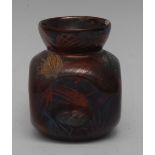 A Clement Massier pottery vase, dimpled, with an iridescent copper oxide glaze with wispy leaves,