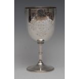 A Victorian silver pedestal goblet, hemi-ovoid bowl engraved with leafy strapwork, knopped stem,