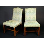 A pair of George III design mahogany side chairs, rectangular backs with serpentine crestings,