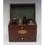 A George III mahogany apothecary's box, hinged cover with brass swan neck handle,