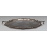 A late Victorian silver two-handled oval serving tray, plain field,