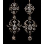 A pair of diamond encrusted chandelier earrings,