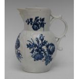 A Caughley cabbage leaf moulded mask jug, printed in blue with flower sprays, scroll handle,