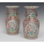 A pair of Chinese Famille Rose vases,