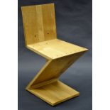 Gerrit Rietveld (1888 - 1964), after, a Zig-Zag chair, of oak construction with exposed screws, 75.
