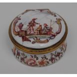 A George III South Staffordshire enamel circular box, the cover with soldiers and landscape,