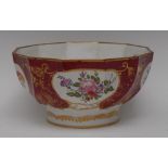 A large writhen panelled bowl, in the manner of Swansea,