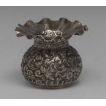 An Indian silver compressed ovoid vase, chased with lions amongst scrolling foliage,