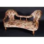 A Victorian walnut kidney-shaped double-spoon back sofa, stuffed-over deep button upholstery,