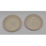 A pair of Chinese Qing Bai porcelain saucer dishes,