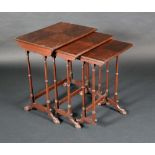 A nest of three Chippendale Revival mahogany rounded rectangular tables, by Baker of Bath,