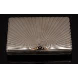 A Russian Art Deco silver cigarette case, rectangular body allover cast in a sunburst pattern,