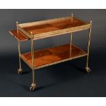 A Louis XV design gilt metal mounted kingwood rectangular two-tier serving trolley,