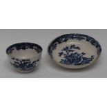 A Liverpool Two Quail pattern tea bowl and saucer, printed in underglaze blue with quails,