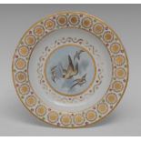 A Derby circular plate, painted with birds in flight,