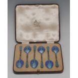 A set of six George V silver and enamelled coffee spoons,