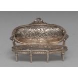 A Dutch silver toy model sofa, in the Louis XV taste, embossed with courting couples, 10.