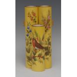 A Royal Worcester Aesthetic movement triple spill vase, with two cylindrical spills and one smaller,