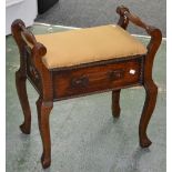 An oak piano stool with hinged lid, 1940s,