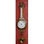 An early 20th century E Elam banjo barometer/thermometer, carved oak case,
