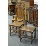 Four oak Gothic revival hall chairs, cresting top rail, finialed barley twist uprights,