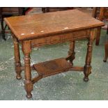An oak communion table, rectangular top, carved arched panels to frieze,