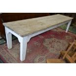A large painted pine refectory table, scrubbed plank top. 77cm high x 303cm long x 78cm wide.