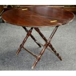 A late Victorian mahogany coaching table, maker's label, c.