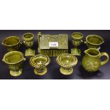 Holkham Hall Pottery - three pairs of miniature green glazed garden urns;