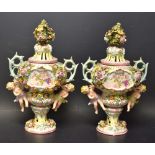 A pair of Dresden ogee shaped vases and covers, encrusted with flowers and foliage,