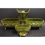 Holkham Hall Pottery - four graduated green glazed troughs with strawberry design;