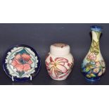 A Contemporary Moorcroft slender baluster vase, sweet pea, 17cm; others, a ginger jar, pink flower,