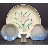 A Poole plate decorated with hand painted flowers; a Royal Copenhagen seagull pattern dish;