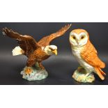 A Beswick model of an owl, impressed marks, number 1046; another, eagle with outstretched wings,