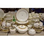 A Czechoslovakian white dinner service, banded in gold,