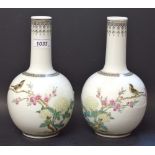 A pair of Chinese bottle vases, printed with birds and blossoming prunus,