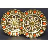 A pair of Royal Crown Derby 1128 pattern shaped circular dessert plates,