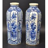 A pair of Dutch pottery Delft style octagonal vases,