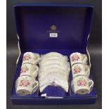 A Royal Worcester coffee set for six comprising coffee cans and saucers,