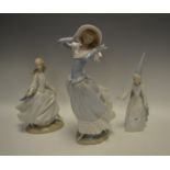 A Lladro figure of a girl in a bonnet; another as Cinderella (faults);