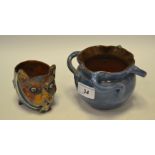 A Charles Brannam Barum Barnstaple art pottery novelty jar, as a comical dog, incised marks, c.