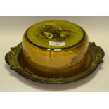 A Royal Doulton series ware cheese dome and stand, transfer decorated with a landscape,