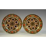 A pair of Royal Crown Derby 1126 pattern plates