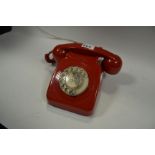 A 1960's red telephone,