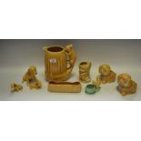 Sylvac - a Sylvac Squirrel vase impressed with 1959; a Sylvac Spaniel and Pups impressed 18;