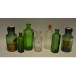 A pair of green glass poison bottles; others ;