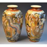 A pair of Japanese Satsuma vases decorated with Dragon and Samurai,